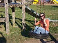 E on the tire swing